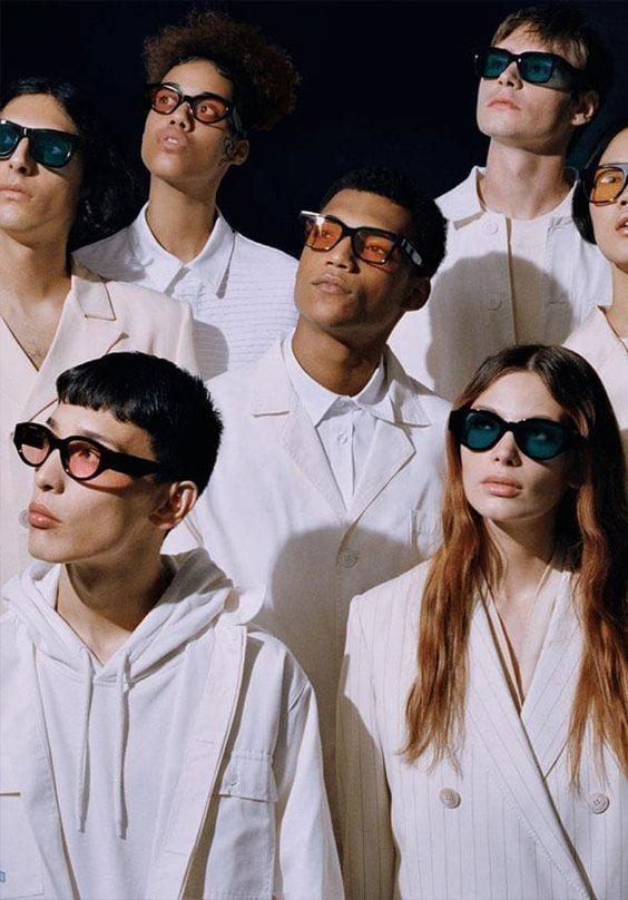 A group of people looking up, questioning